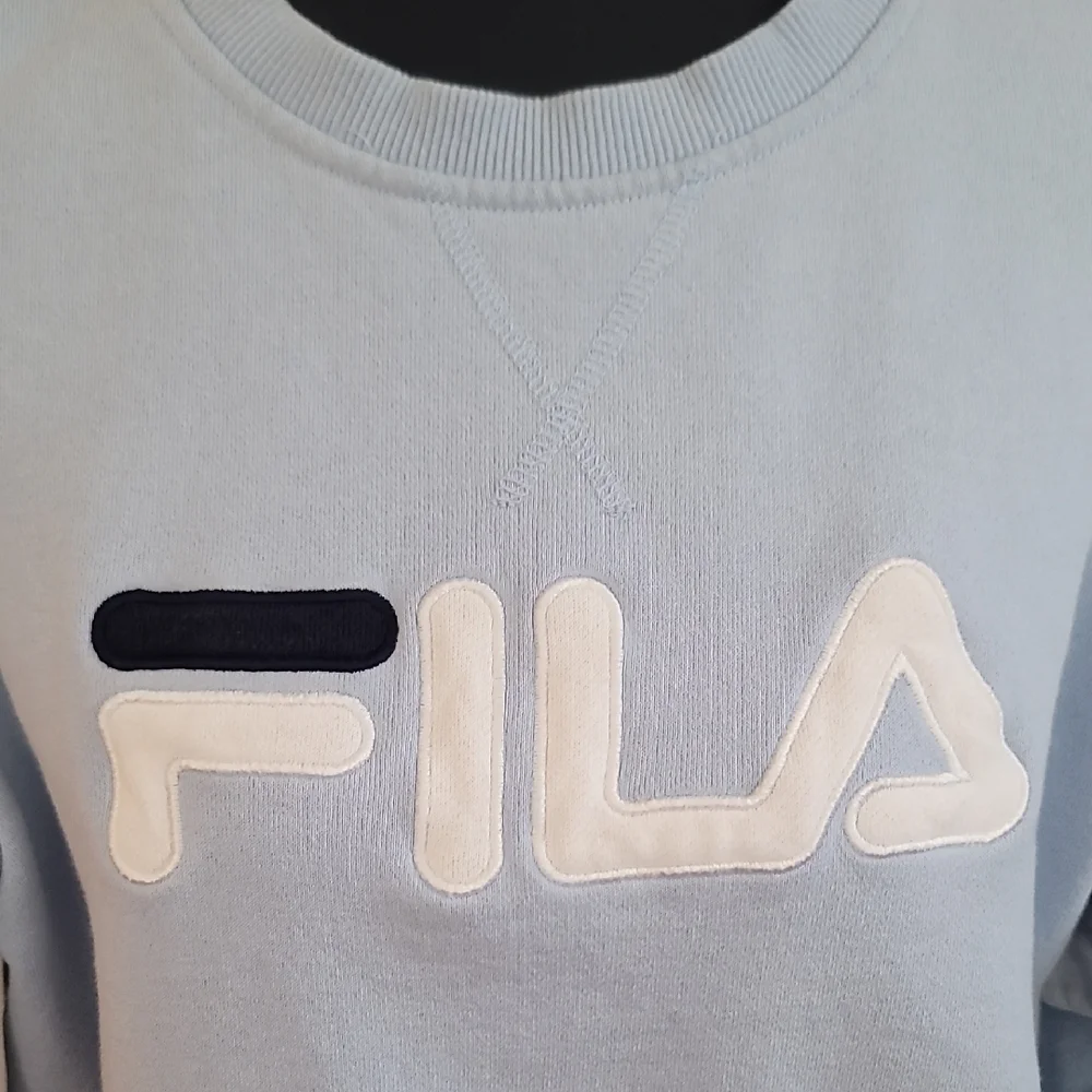 Fila Light Blue Sweatshirt with Navy and White Accents
